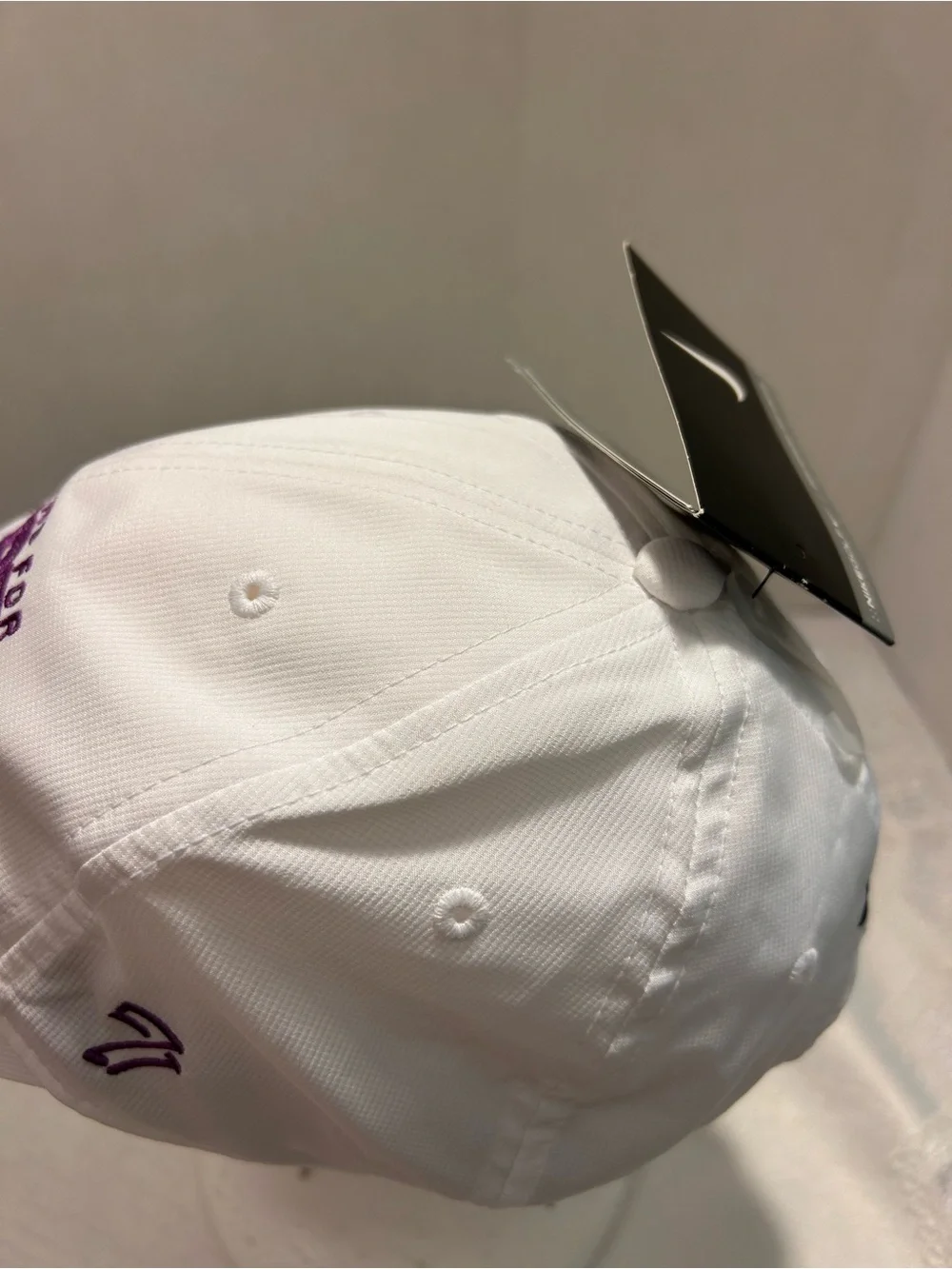 Nike Champions For Hope Dri-Fit Golf Cap with purple embroidery